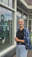 Kom gluren naar ons raam tijdens Drawstreet